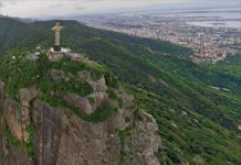 Stunnning photo pf Cristo Redentor perched at the top of Corcovado mountain, Rio de Janeiro