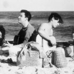 Joao Gilberto and Antonio Carlos Jobim with a pair of French actresses., Ipanema beach , RIo de Janeiro