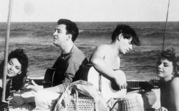 Planning Bossa Nova’s 60th Celebration Joao Gilberto and Antonio Carlos Jobim with a pair of French actresses., Ipanema beach , RIo de Janeiro