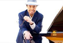 The Sounds of Brazil’s meet and greet with Sergio Mendes, pictured next to his grand piano.