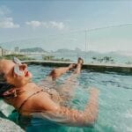 Female savoring Copacabana Rooftop Pool Crawl