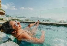 Female savoring Copacabana Rooftop Pool Crawl