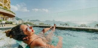 Female savoring Copacabana Rooftop Pool Crawl