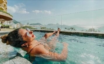 Copacabana Rooftop Pool Crawl Female savoring Copacabana Rooftop Pool Crawl