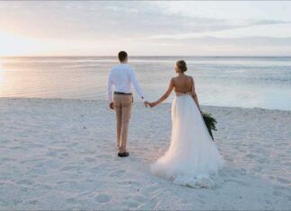 Newlyweds - A groom and bride beach weeding