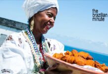 African Culture In Brazil Baiana woman from Bahia holds a woven basket of Acaraje, African Culture in Brazil