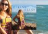 Eliane Elias’s Quietude Shares Personal Favorites . Brazilian jazz pianist and vocalist Eliane Elias Sits on stone wall near ocean