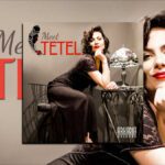 Jazzy And Vivacious, Meet Tetel Di Babuya, Jazz singer from Brazil, seated in a vintage pose at a parlor table with lace dress