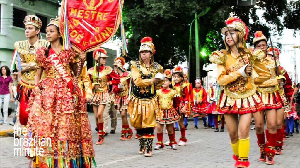 Explaining Brazils Christmas Traditions. Folia de Reis is celebrated to honor the Three Kings,  Costume people in a parade.