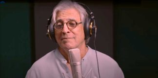 Brazilian singer Ivan Lins poses in studio for his song Renata Maria.